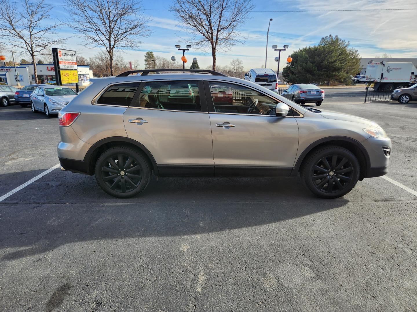 2010 Liquid Silver Metallic /Black Mazda CX-9 Grand Touring (JM3TB3MA6A0) with an 3.7L V6 DOHC 24V engine, Automatic transmission, located at 10890 W. Colfax Ave., Lakewood, CO, 80215, (303) 274-7692, 39.739914, -105.120132 - 2010 Mazda CX-9<br><br>D1 Auto NEVER charges dealer fees! All cars have clean titles and have been inspected for mechanical issues. We have financing for everyone. Good credit, bad credit, first time buyers.<br><br>Please call Lakewood Location 303-274-7692 or Thornton 303-287-5511 to schedule a tes - Photo#4